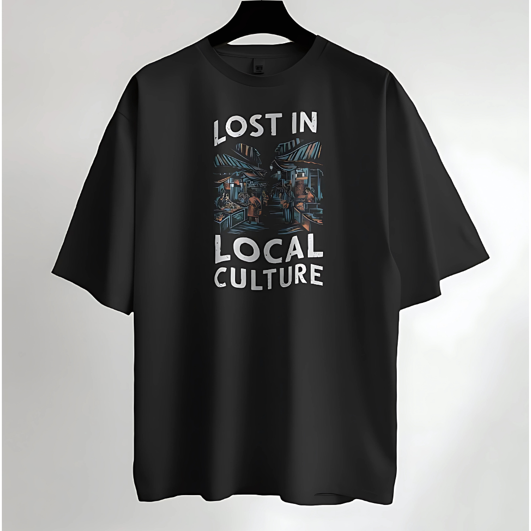 A cozy oversized T-shirt featuring a bold design that celebrates local vibes, travel, and cultural diversity, perfect for adventurous travelers.