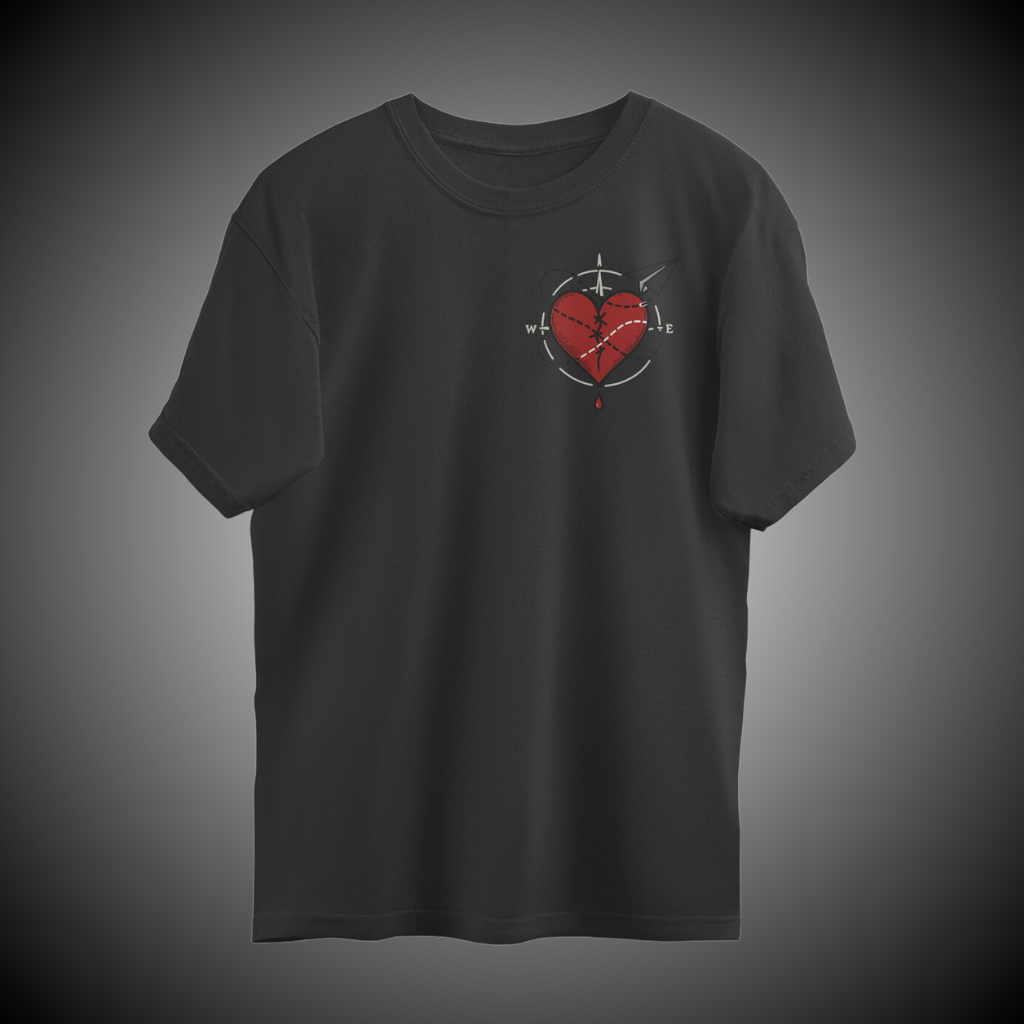 Unisex oversized black graphic t-shirt with bleeding heart and travel-inspired artwork