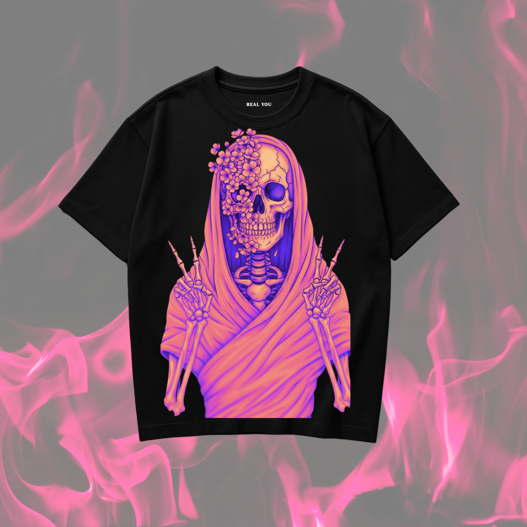 "Black oversized skeleton t-shirt featuring a detailed graphic print of a grim reaper skeleton with part of its skull adorned with purple and pink flowers, holding up peace signs. This is a black skeleton shirt suitable for adults."